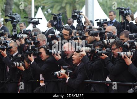 Fotografi fotografati sul tappeto rosso durante il 64° Festival Internazionale del Cinema di Cannes, al Palais des Festivales di Cannes, Francia. Foto Stock