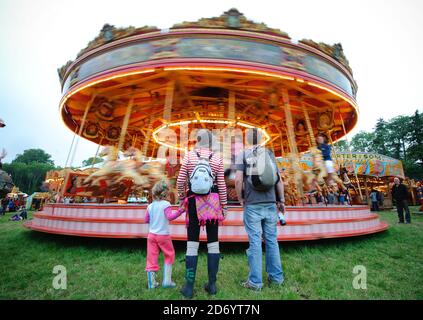 Giostre al festival Womad di Charlton Park, Wiltshire. Foto Stock