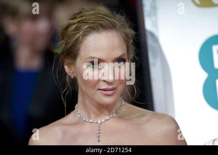 UMA Thurman arriva all'EE British Academy Film Awards 2014, presso la Royal Opera House, Bow Street, Londra. Foto Stock