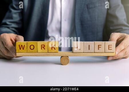 equilibrio tra concetto di lavoro e di vita Foto Stock