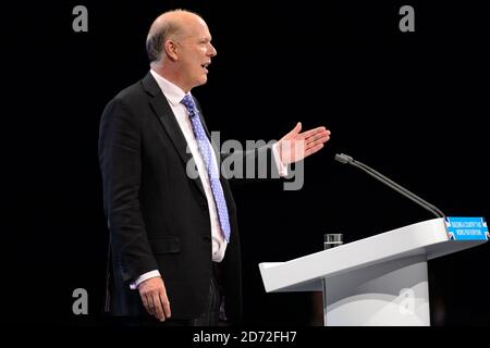 Il Segretario di Stato per i Trasporti Chris Grayling ha tenuto un discorso alla Conferenza del Partito conservatore, al Manchester Central Convention Complex di Manchester. Data immagine: 2 ottobre, 2017. Il credito fotografico dovrebbe essere: Matt Crossick/ EMPICS Entertainment. Foto Stock