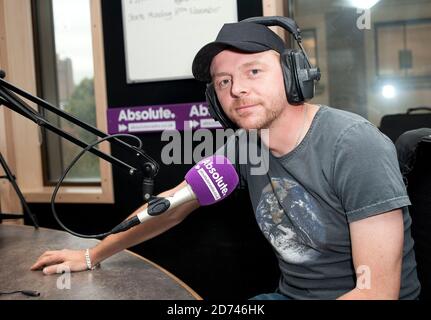 Simon Pegg appare su Christian o'Connell's Breakfast Show su Absolute radio, nei loro studi nel centro di Londra Foto Stock