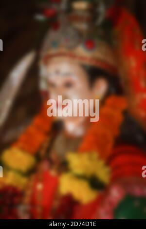 festa indiana navratri. lord durga devi blur bokeh sfondo foto d'azione Foto Stock