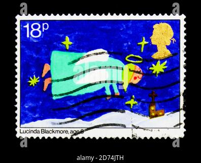 MOSCA, RUSSIA - 24 NOVEMBRE 2017: Un francobollo stampato in Gran Bretagna mostra Flying Angel, Christmas - Children's Pictures serie, circa 1981 Foto Stock