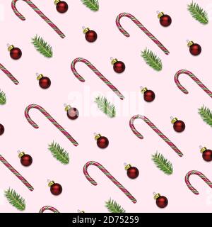 Illustrazione 3D di sfondo rosa di natale o Capodanno con bastoncini di canna caramella, palline rosse e rami di abete. Concetto di carta da imballaggio per l'inverno Foto Stock