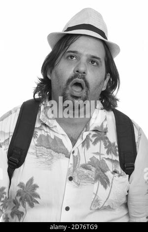 Fat uomo caucasico guardando scioccato pronto per le vacanze Foto Stock