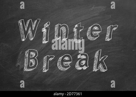 Testo del disegno a mano Inverno Break sulla lavagna Foto Stock
