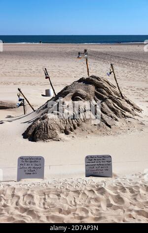 Una scultura di sabbia lungo la Ocean City, MD Boardwalk raffigura il volto di Gesù Cristo. Foto Stock