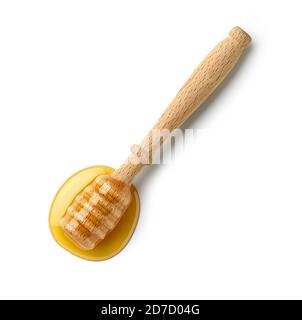 cucchiaio di miele in legno isolato su sfondo bianco, vista dall'alto Foto Stock