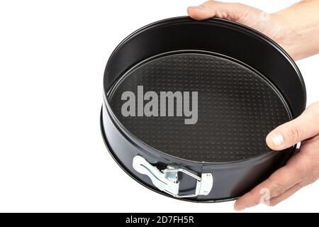 Teglia da forno a mano isolata su sfondo bianco. Foto Stock