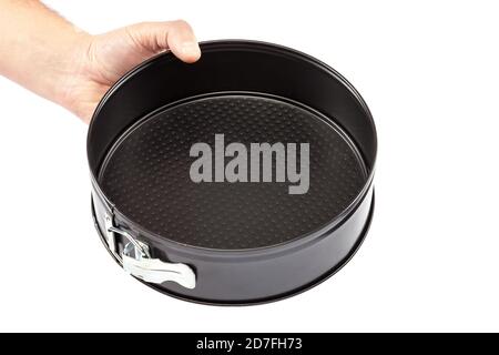 Teglia da forno a mano isolata su sfondo bianco. Foto Stock