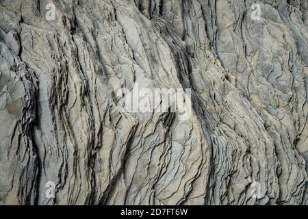 Sfondo da formazioni rocciose vulcaniche basaltiche nella spiaggia di Reinisfjara vicino Vik nel nord dell'Islanda Foto Stock