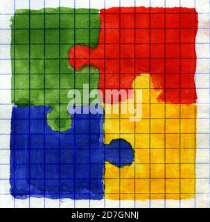 Pezzi di puzzle colorati dipinti su carta matematica. Foto Stock