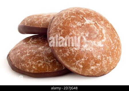 Tre lebkuchens di pan di zenzero smaltati con cioccolato isolato su bianco. Foto Stock