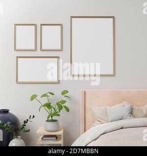 Poster interno mock up con cornici sulla parete in casa camera da letto interno. Rendering 3D. Foto Stock