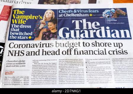 "Bilancio del coronavirus per sostenere l'NHS e decifrare il bilancio finanziario Crisis' Guardian Newspaper headline article 11 marzo 2020 Londra Inghilterra REGNO UNITO Foto Stock