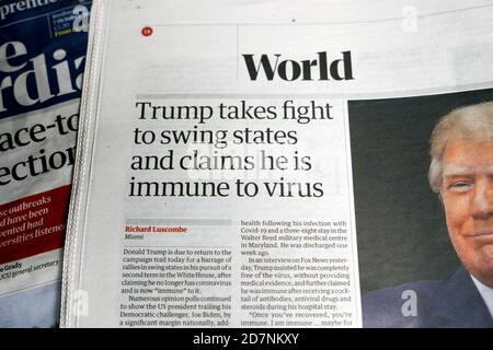 "Trump prende la lotta per swing stati e sostiene di essere Immune to virus' Guardian Newspaper headline article October 2020 London Inghilterra Regno Unito Foto Stock