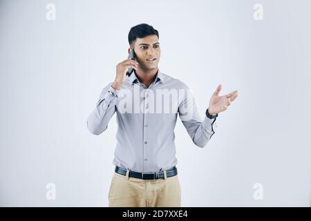 Imprenditore parlando al telefono Foto Stock