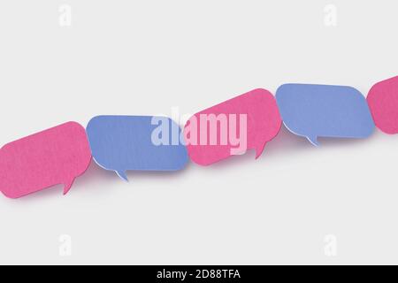 Bolle di parole rosa e blu collegate tra loro in una catena - concetto di comunicazione tra uomini e donne (comunicazione di genere) Foto Stock