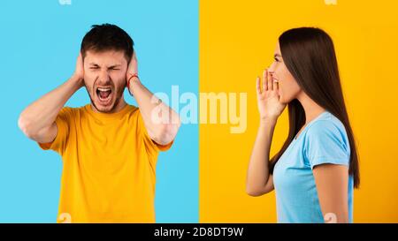 Giovane donna arrabbiata che urla al marito Foto Stock