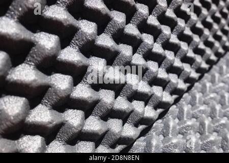 Particolare di un materiale plastico isolante a forma di coni. Foto Stock