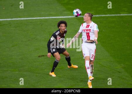 Colonia, Germania. 31 Ott 2020. Bundesliga Matchday 6, 1. FC Koeln - FC Bayern Muenchen, Leroy Sane (FCB), Marius Wolf (Koeln) Credit: Juergen Schwarz/Alamy Live News Foto Stock