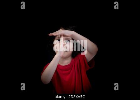 bambino che fa una pausa o un gesto della mano tempo di pausa Foto Stock