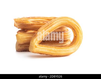 Gustosi churros fritti isolati su sfondo bianco. Foto Stock