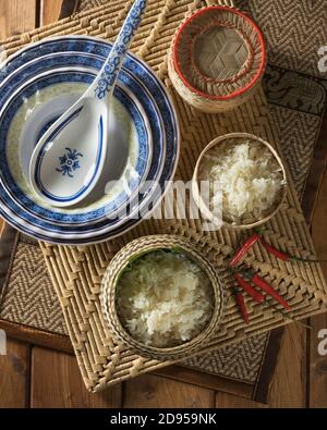 Riso appiccicoso. Laos, Thailandia Sud-Est asiatico alimentare Foto Stock