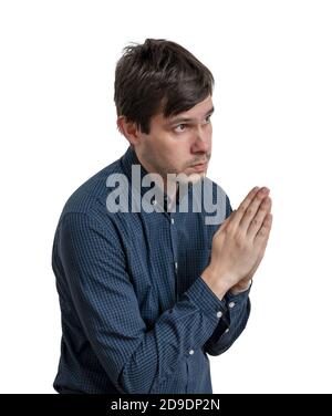 L'uomo triste sta pregando e chiedendo aiuto. Isolato su sfondo bianco. Foto Stock