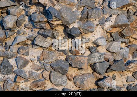 Vista dall'alto di ghiaia sassi schiacciati sulla sabbia Foto Stock