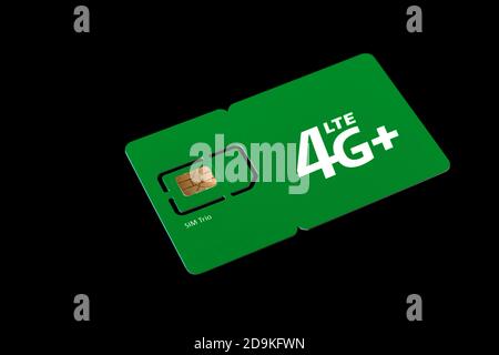 Dimensioni delle schede sim. Scheda SIM standard, micro e nano raccolta nella scheda. Scheda SIM per telefono su sfondo nero. Foto Stock