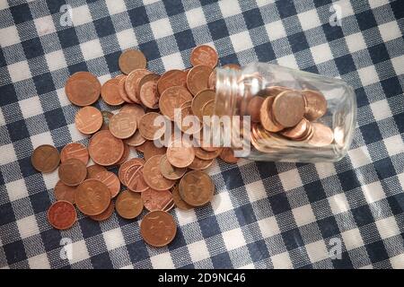 Monete, penty Jar- risparmio Foto Stock