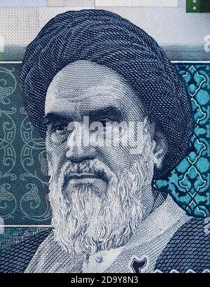 Ritratto di Yatollah Ruhollah Khomeini su macro di banconote da 20000 rial iraniane, primo piano di denaro iraniano Foto Stock