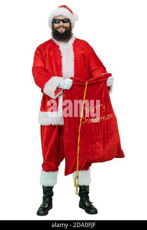 Santa con regali sacco. Il giovane arabo Babbo Natale con barba nera tiene la borsa da regalo su sfondo bianco. Natale in arrivo Foto Stock