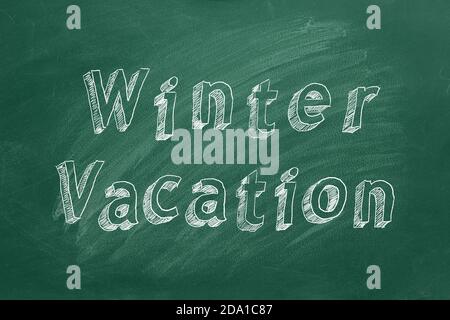 Testo del disegno a mano Vacanze invernali su lavagna verde Foto Stock
