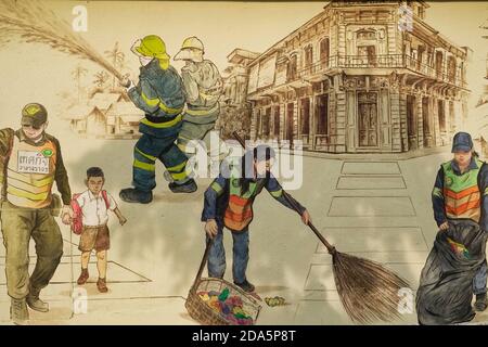 Un murale a Ong Ang Walking Street di Klong Ong Ang, Chinatown / Phahurat, Bangkok, Thailandia, raffigurante gli addetti alla pulizia della strada, vigili del fuoco e un poliziotto al lavoro Foto Stock