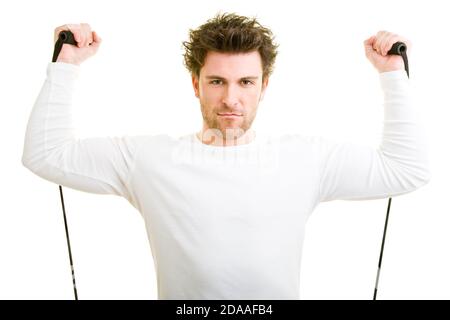 Il giovane si allena con l'espansore Foto Stock