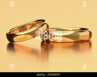 Due anelli di oro di nozze si trovano l'uno accanto all'altro. Concetto di amore. rendering 3d Foto Stock