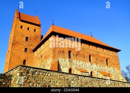 Il Palazzo Ducale e la prigione del Castello dell'Isola a Trakai, Lituania Foto Stock