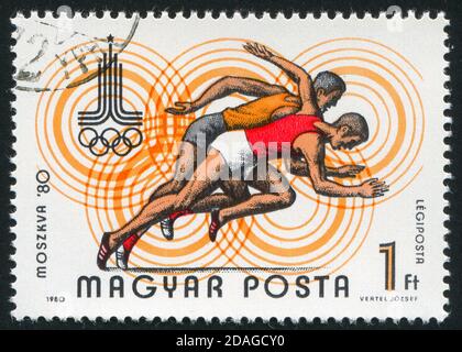 UNGHERIA - CIRCA 1980: Francobollo stampato dall'Ungheria, mostra corridore, circa 1980 Foto Stock