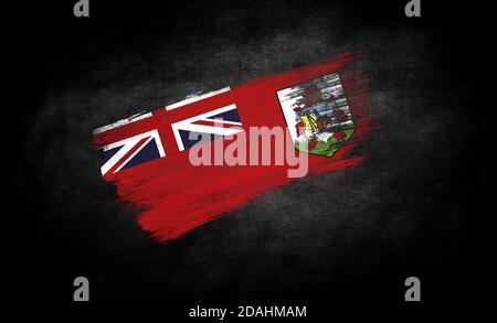 cospargere di vernice sotto forma di bandiera di Primo piano delle Isole Bermuda su sfondo nero Foto Stock