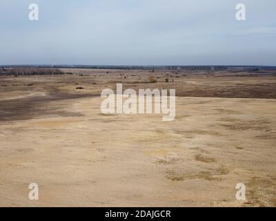 Terreno agricolo, vista aerea. Orizzontale. Campi arabili in primavera. Foto Stock