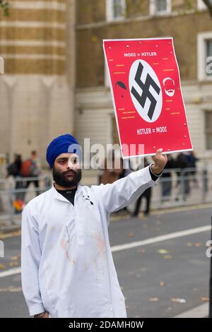 Una protesta contro la visita di Stato dei primi ministri indiani Narendra modi, in Gran Bretagna. Whitehall, Westminster, Londra, Regno Unito. 12 Nov 2015 Foto Stock