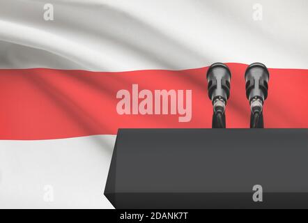 Pulpito nero e due microfoni con una bandiera sullo sfondo - Bielorussia Foto Stock