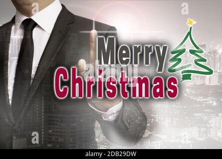 Buon Natale è mostrato dal concetto di uomo d'affari. Foto Stock