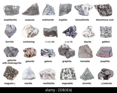 set di varie rocce grigie non lucidate con nomi (antimonite, cromite, grafite, melilitolite, bornite, galenite, sphalerite, magnetite, ematite, coppa Foto Stock