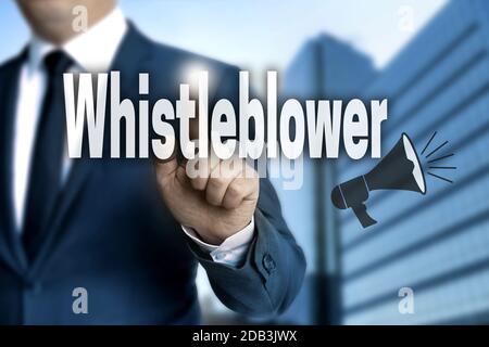 Whistleblower touchscreen is operated by businessman. Stock Photo