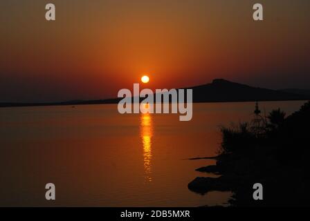 Tramonto sull'isola Foto Stock