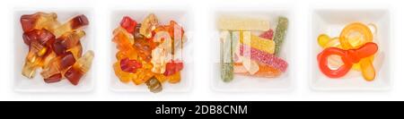 Raccolta di diversi dolci con frutta gum in ciotole in vista superiore Foto Stock